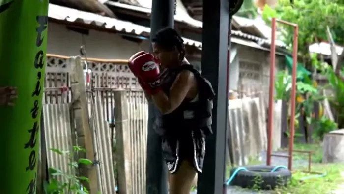Female athlete training in the vest