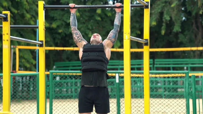 Pull-up on bars in the vest
